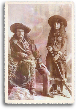 Gordon "Pawnee Bill" and May Manning Lillie pose for a photograph in buckskins and with May